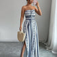 📢📢50% OFF !! ⏰Geometric Jumpsuit with Halter Neckline & Side Slit – Unique print & elastic back – Versatile, perfect for summer parties or resort wear ✨