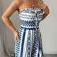 📢📢50% OFF !! ⏰Geometric Jumpsuit with Halter Neckline & Side Slit – Unique print & elastic back – Versatile, perfect for summer parties or resort wear ✨